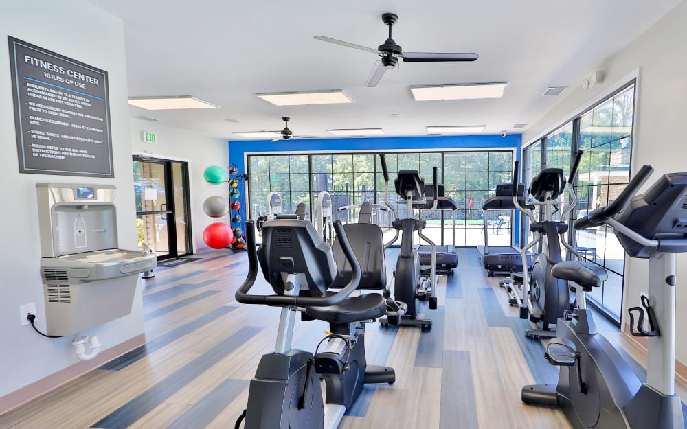 Well-equipped fitness center with cardio equipment at Skylark Pointe Apartment Homes in Parkville, Maryland