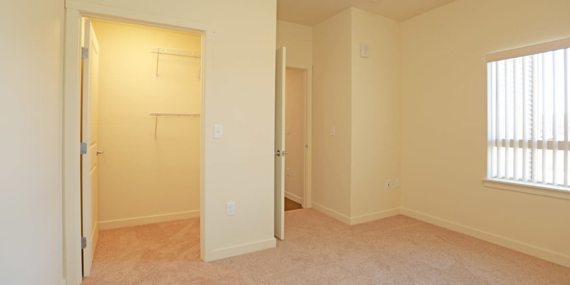 Bedroom with large closet at Copper Stone in Lafayette, Colorado