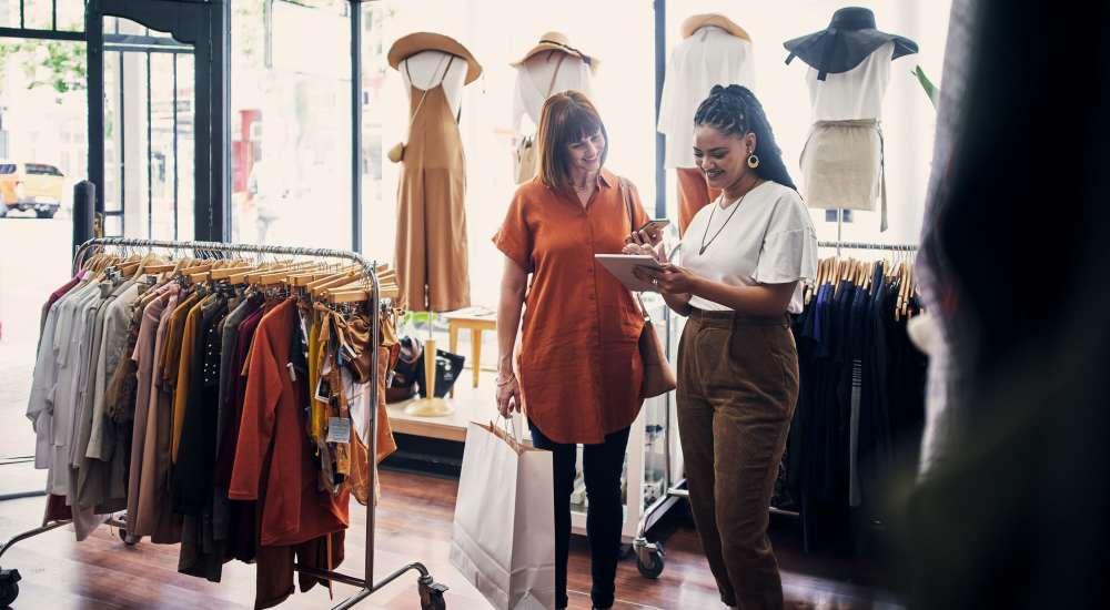 Resident shopping in a boutique near Siena Suwanee Town Center in Suwanee, Georgia