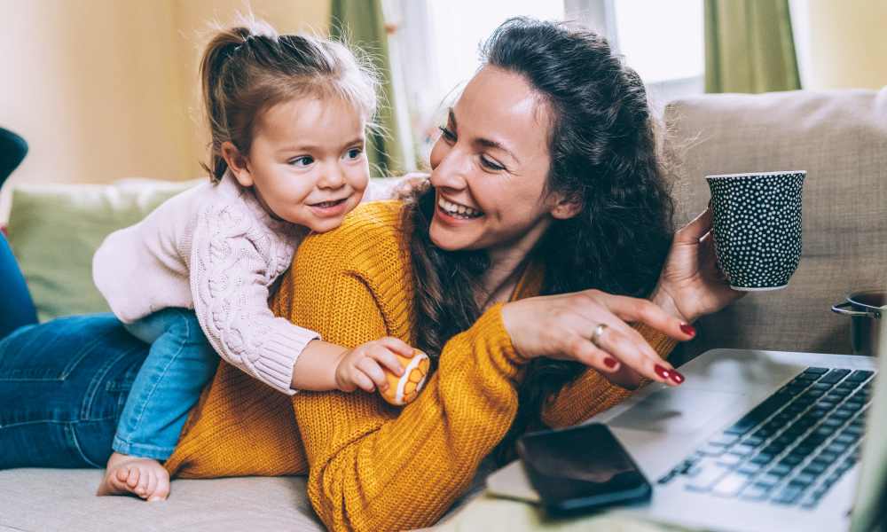 Residents women working in her laptop at RiverWatch Apartments in Elkridge, Maryland