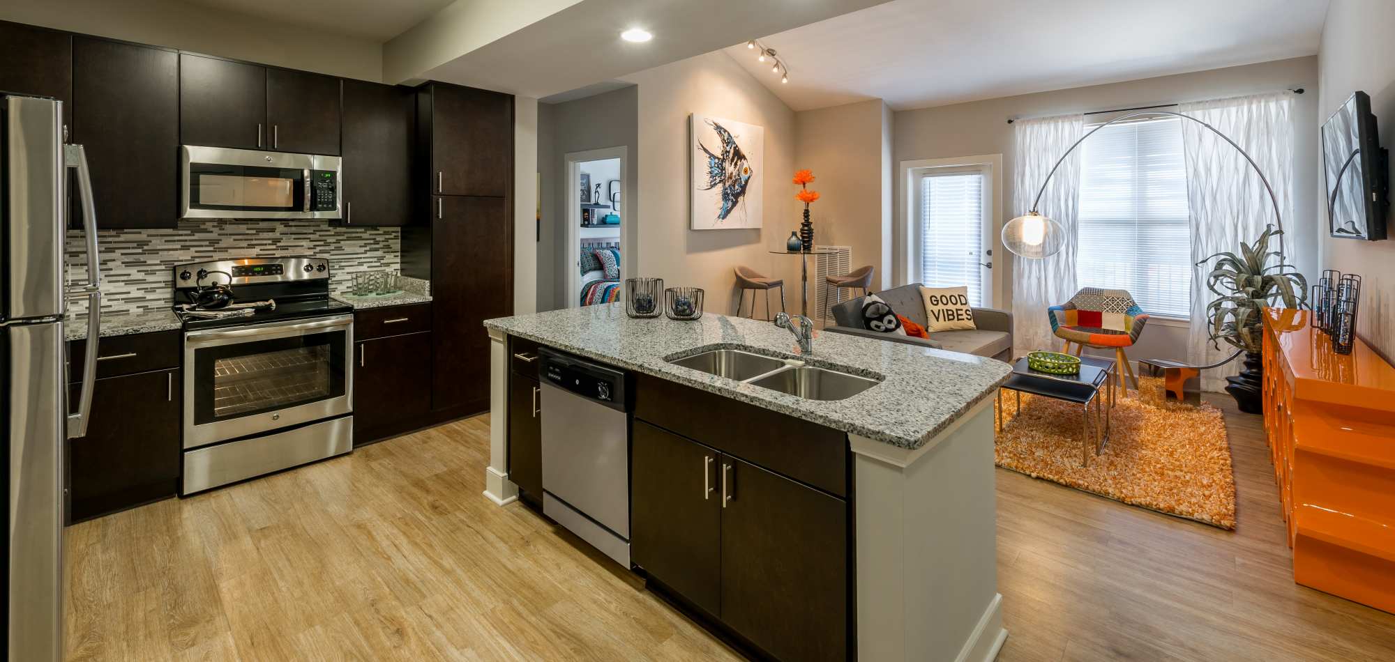 Kitchen with stainless-steel appliances at Infinity at Centerville Crossing, Virginia Beach, Virginia