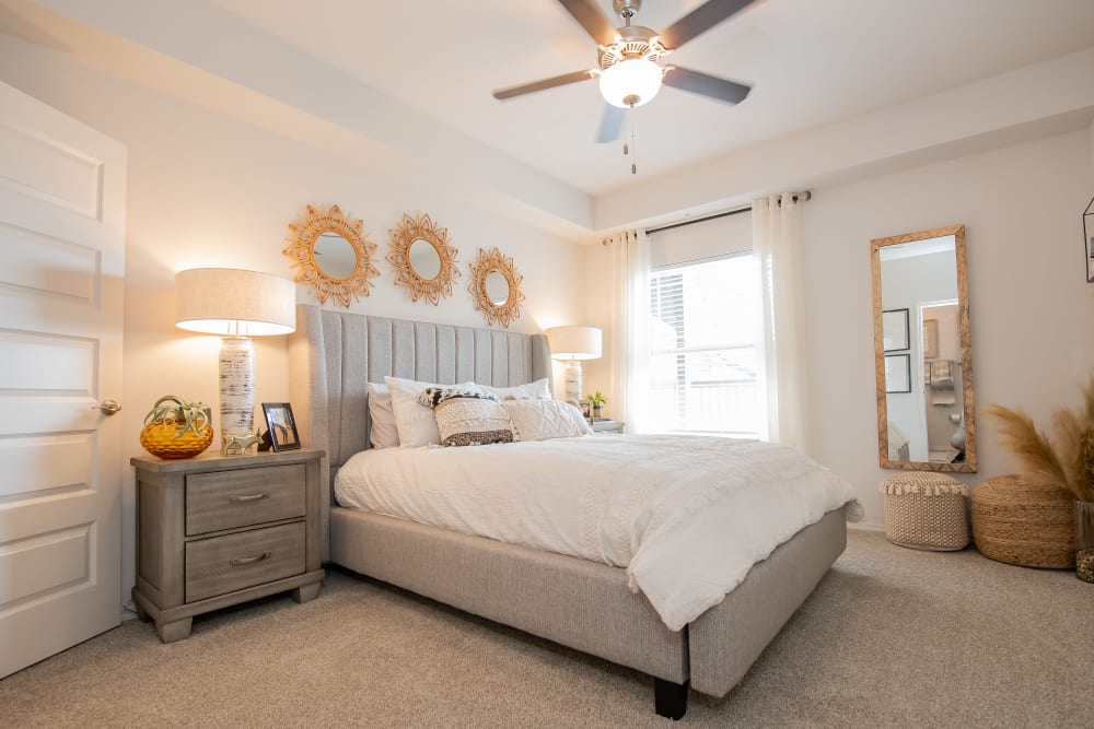 Bedroom with bright light at Artisan Crossing in Norman, lOklahoma