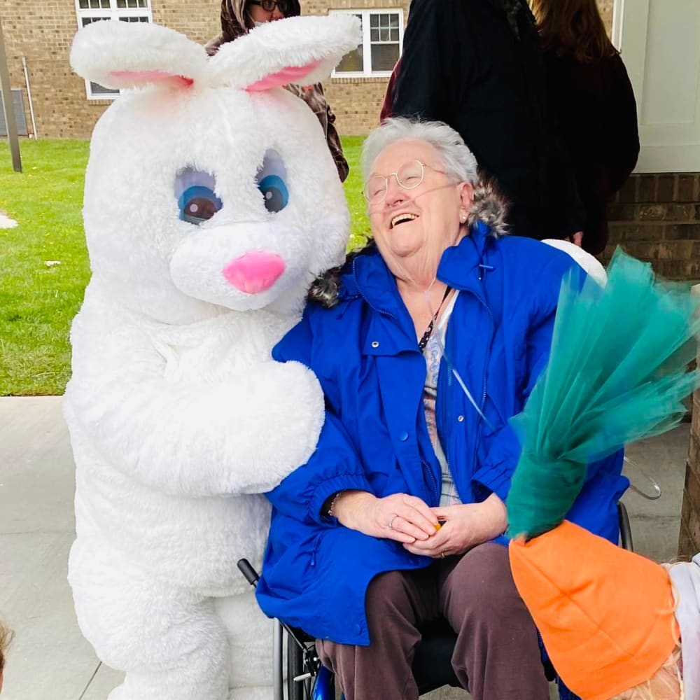 Easter bunny and resident at Carolina Gardens at York in York, South Carolina