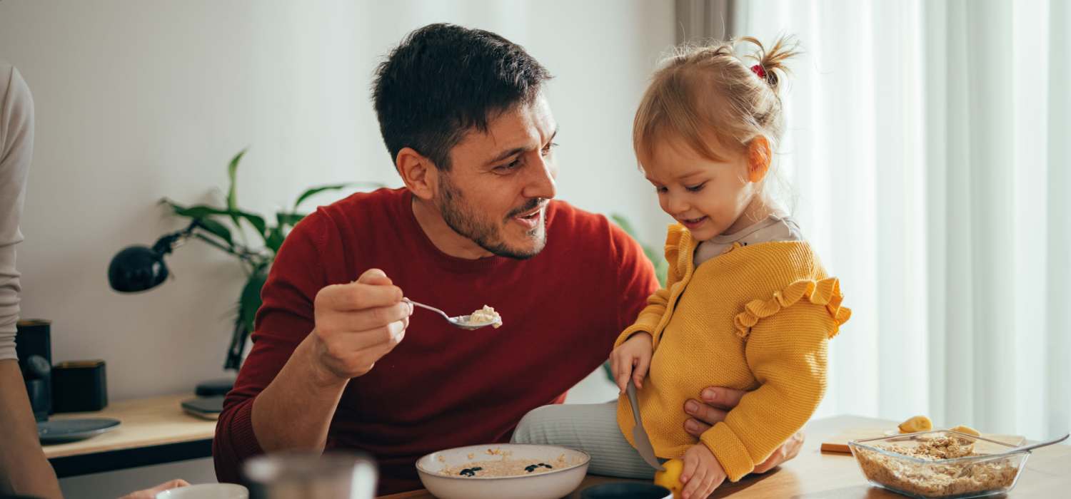 Resident and his kid at Westbury Apartments in Wayland, Michigan