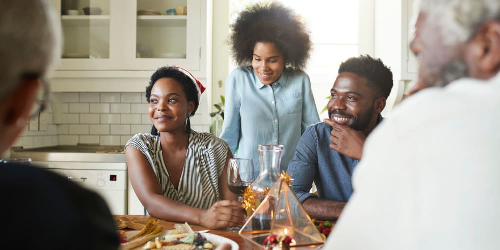 A happy family in their kitchen at Vesta Bouldercrest in Atlanta, Georgia