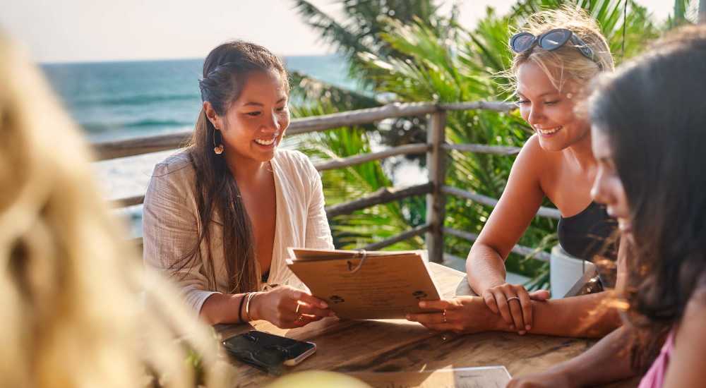 Charming beachfront dining experience with breathtaking ocean views at Park Place Apartments in Port Richey, Florida.