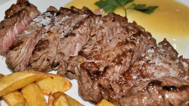 Grilled beef entrecote cut and with coarse salt flakes