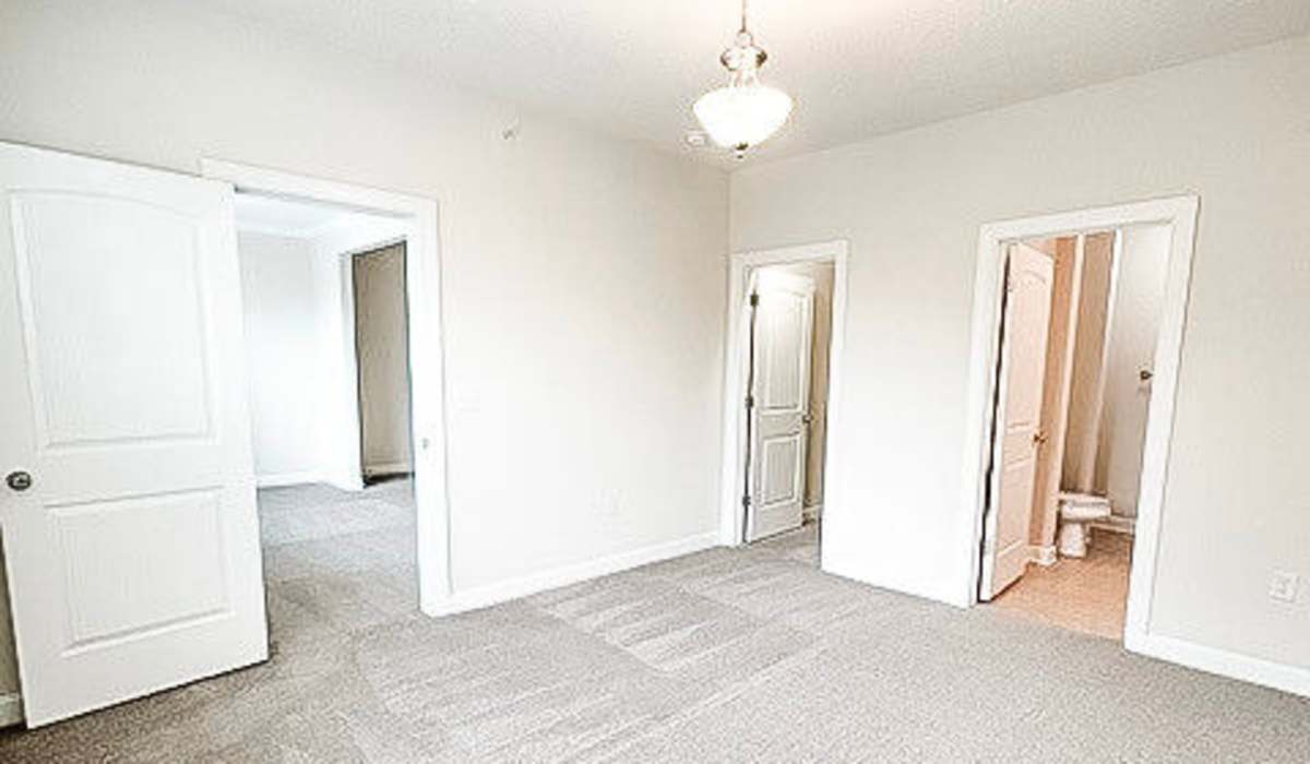 Unfurnished bedroom with bathroom facility at Palisades at Stones Bay in Sneads Ferry, North Carolina