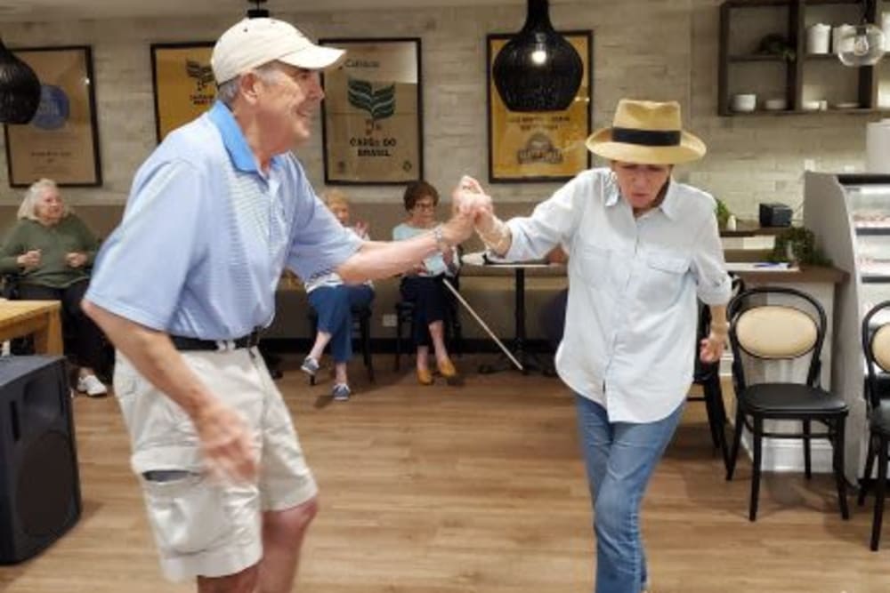 Residents dancing at The Pinnacle at Plymouth Meeting in Plymouth Meeting, Pennsylvania