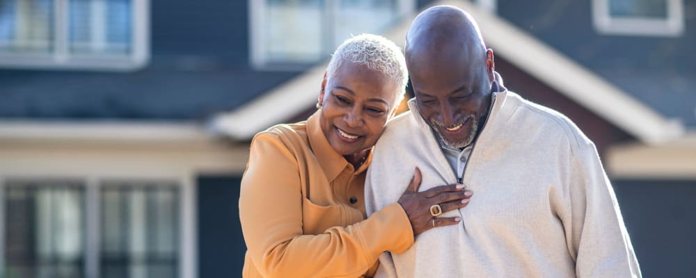 A man and woman walking together at Ridge at Frisco in Frisco, Texas