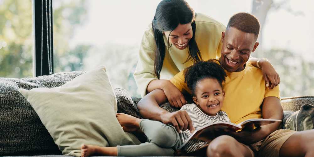 Resident and his family in their living room at Central West End Apartments in Saint Louis, Missouri