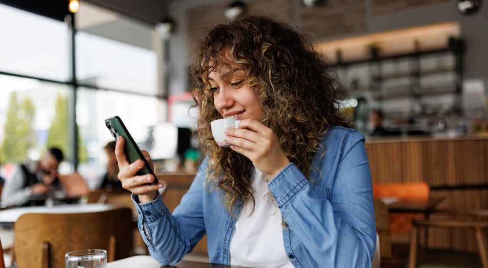 Resident having coffee at a cafe near Pebblestone Gardens in Newport News, Virginia