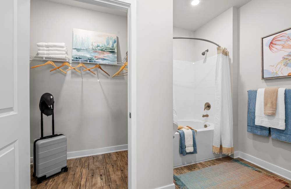 Beautifully finished hardwood flooring in a model apartment's living area at Mexico Beach Crossings in Mexico Beach, Florida