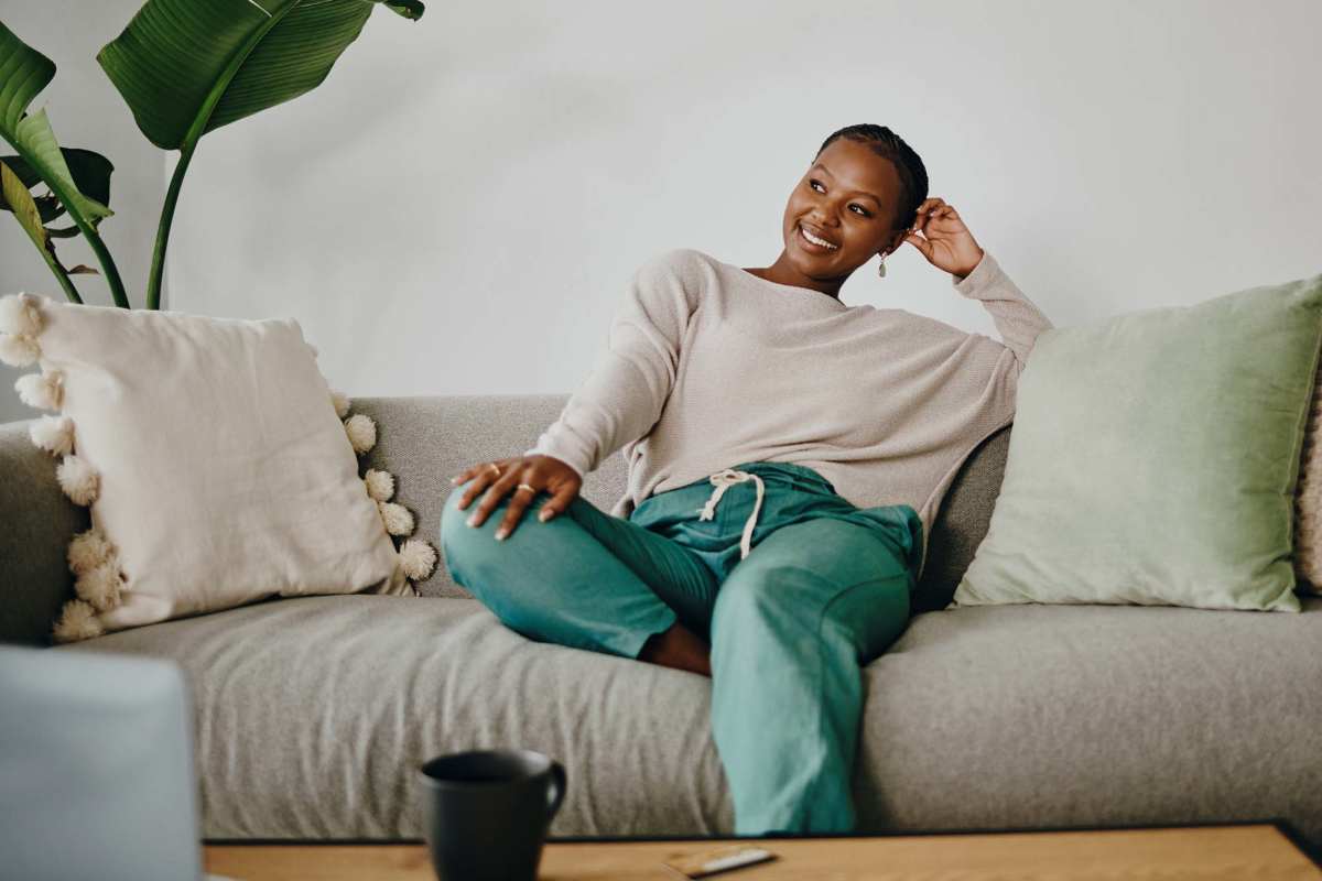  Resident relaxing on a couch at Fontana Pointe in Greeneville, Tennessee