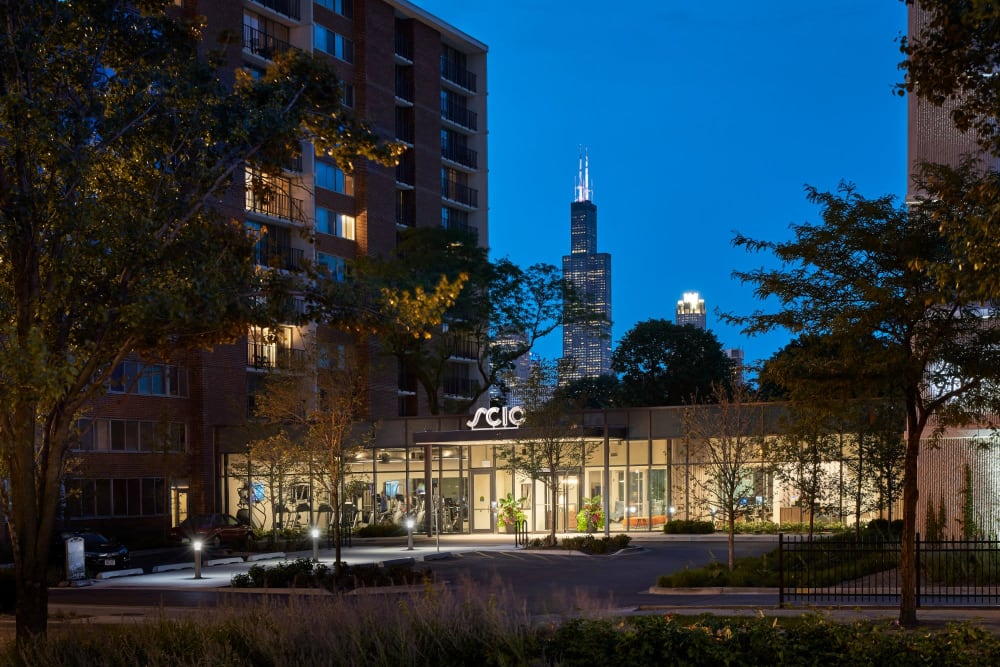Exterior entrance at night of Scio at the Medical District in Chicago, Illinois