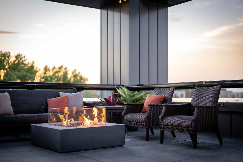 Covered rooftop lounge area with terrific views at Amira Bloomington in Bloomington, Minnesota