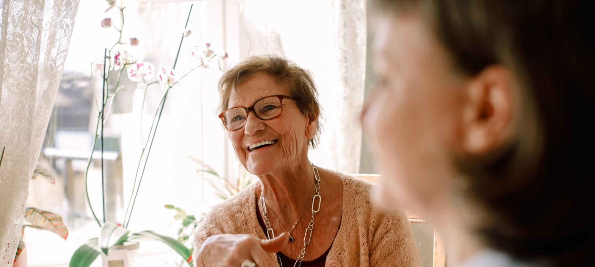 Happy resident at an Grand Villa Senior Living community