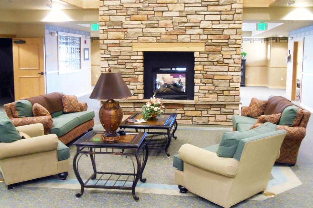Elegant lounge complete with fireplace at Majestic Rim Retirement Living in Payson, Arizona. 