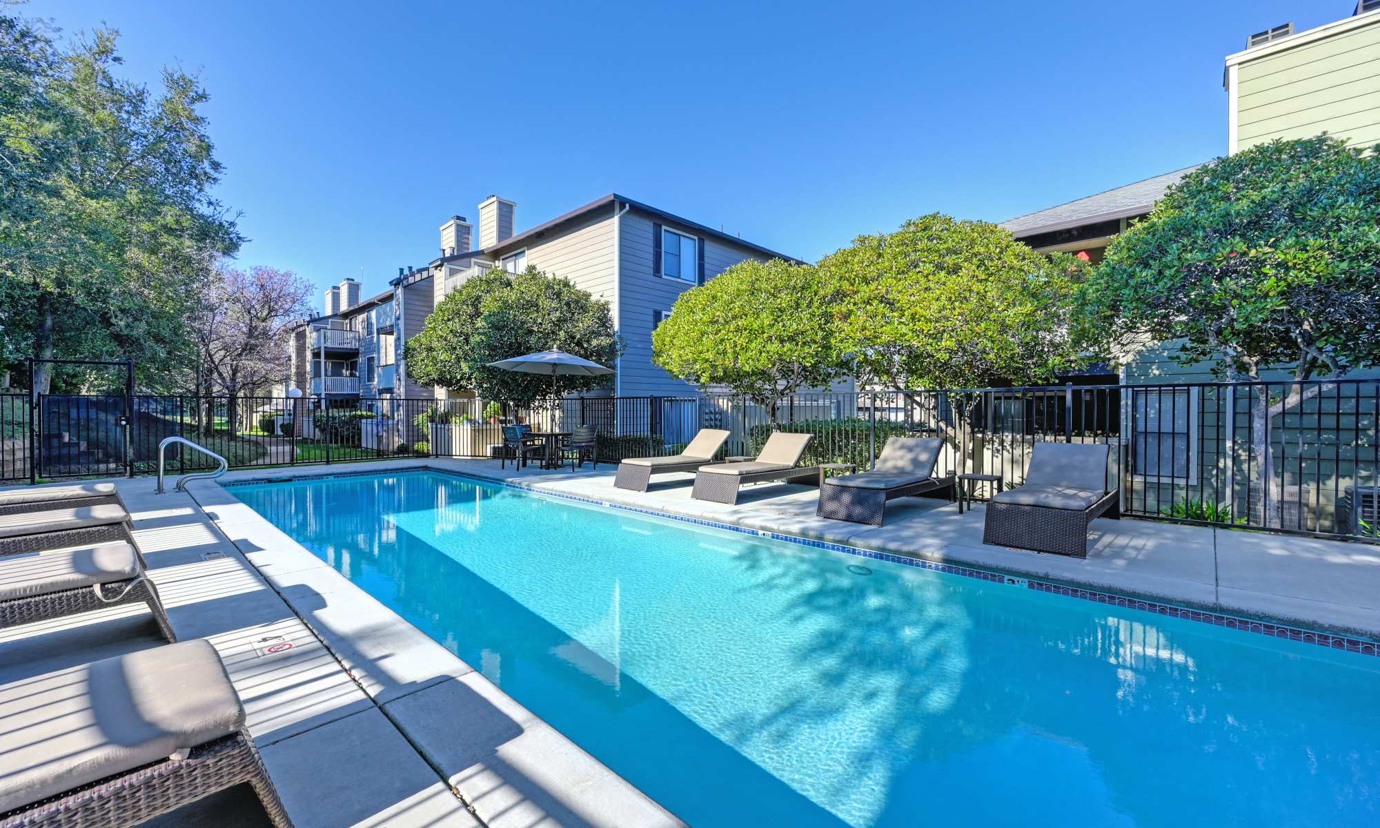 Pool with sun loungers at The Pointe in Fairfield, California