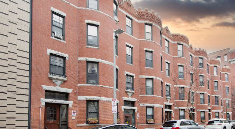 Brick building with rounded corners at 71 Westland Apartments in Boston, Massachusetts
