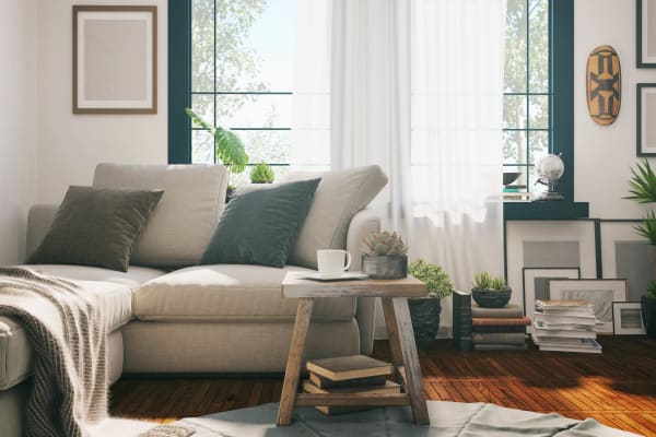 Spacious living room with tons of natural light in an apartment home at Trotter's Landing in Delaware, Ohio