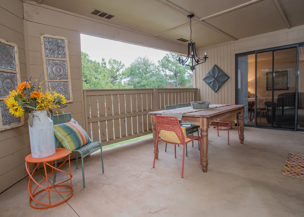 Covered outdoor patio at Woodscape Apartments in Oklahoma City, Oklahoma