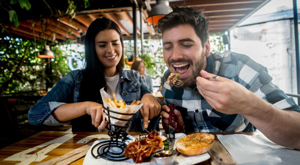 Residents explore the downtown area and grab a bite to eat near The Preston in Spring, Texas
