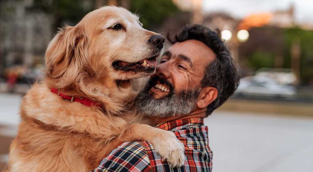 Resident man with his dog enjoying in the neighborhood near Ascent at Aldersgate in Little Rock, Arkansas