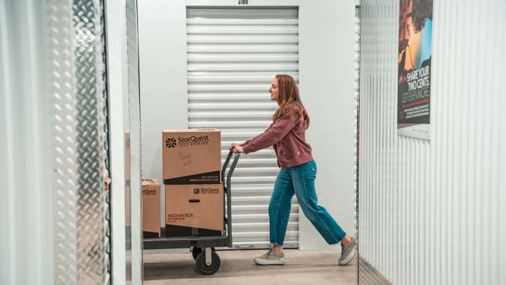 A college student moving in to their summer StorQuest storage unit
