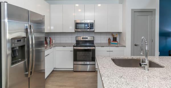 Kitchen with modern appliances at EDGE on the Beltline | Apartments in Atlanta, Georgia