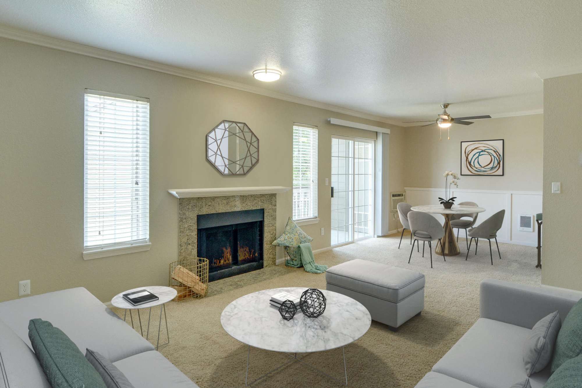 Fireplace and patio access in living rooms at Carriage House Apartments in Vancouver, Washington