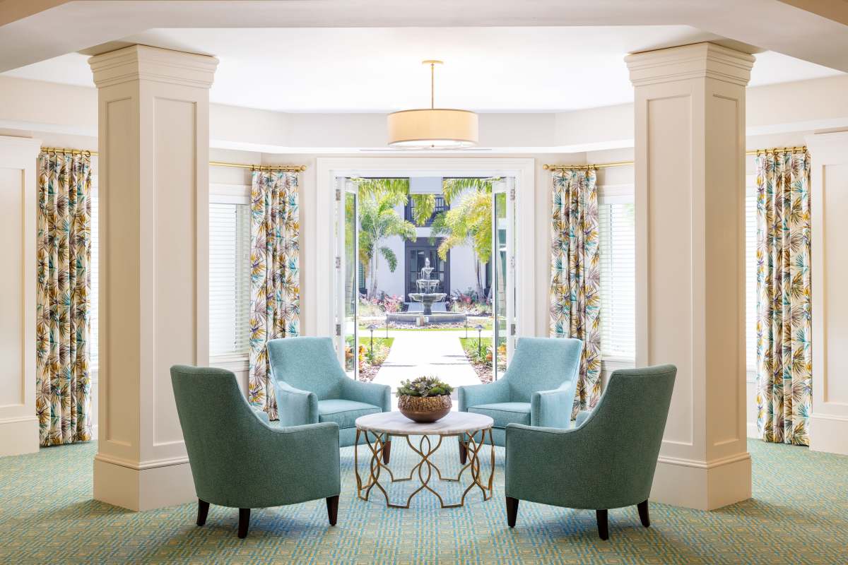 Common area with plenty of seating at Amira Choice Sarasota in Sarasota, Florida.