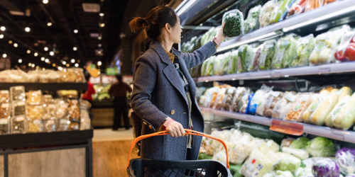 Resident woman buying groceries near North Main Village in Milwaukie, Oregon