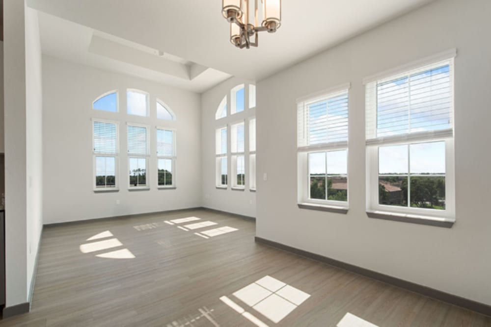 Spacious and sun drenched room with lots of windows at Murano at Three Oaks in Fort Myers, Florida