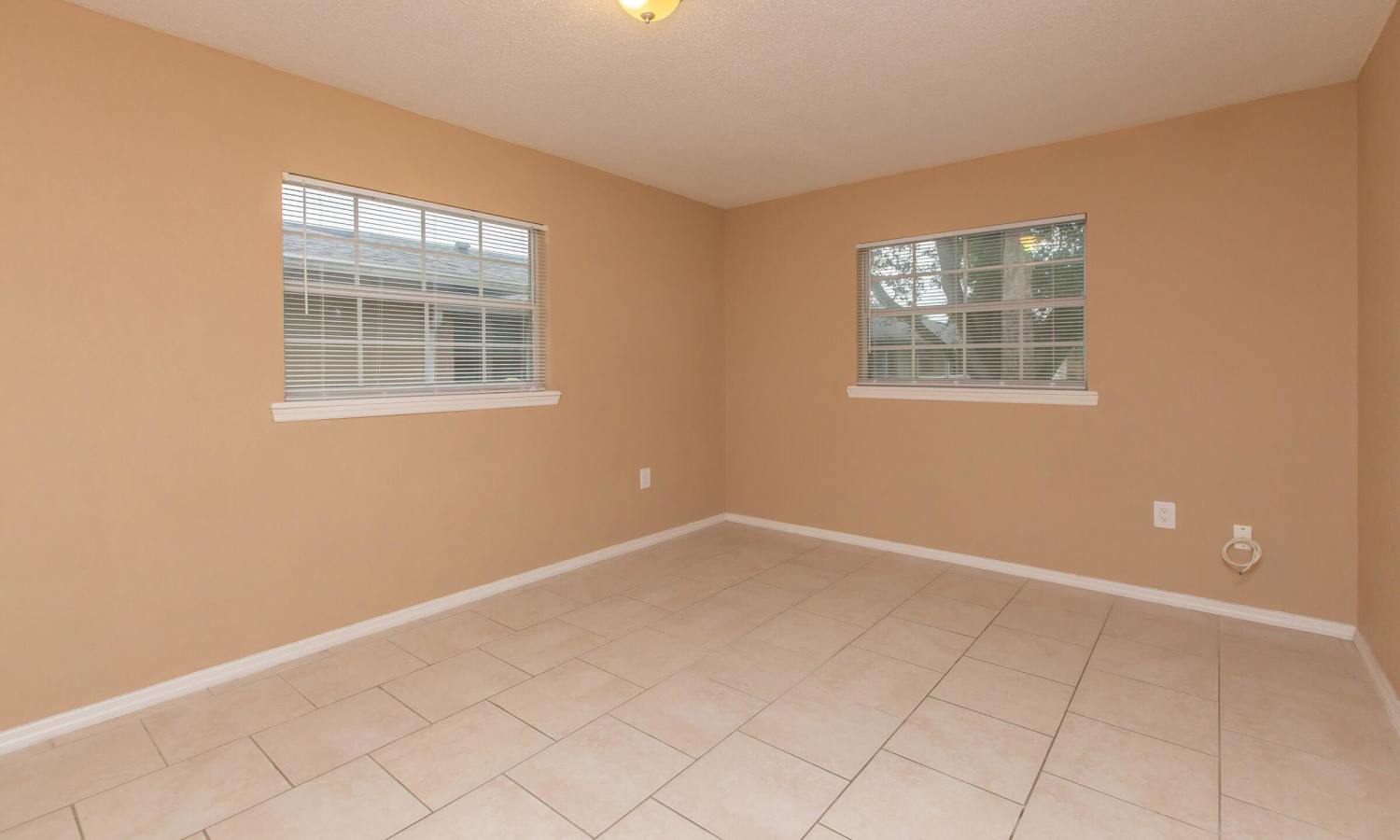 Bright bedroom at Serenity Apartments in Leesburg, Florida