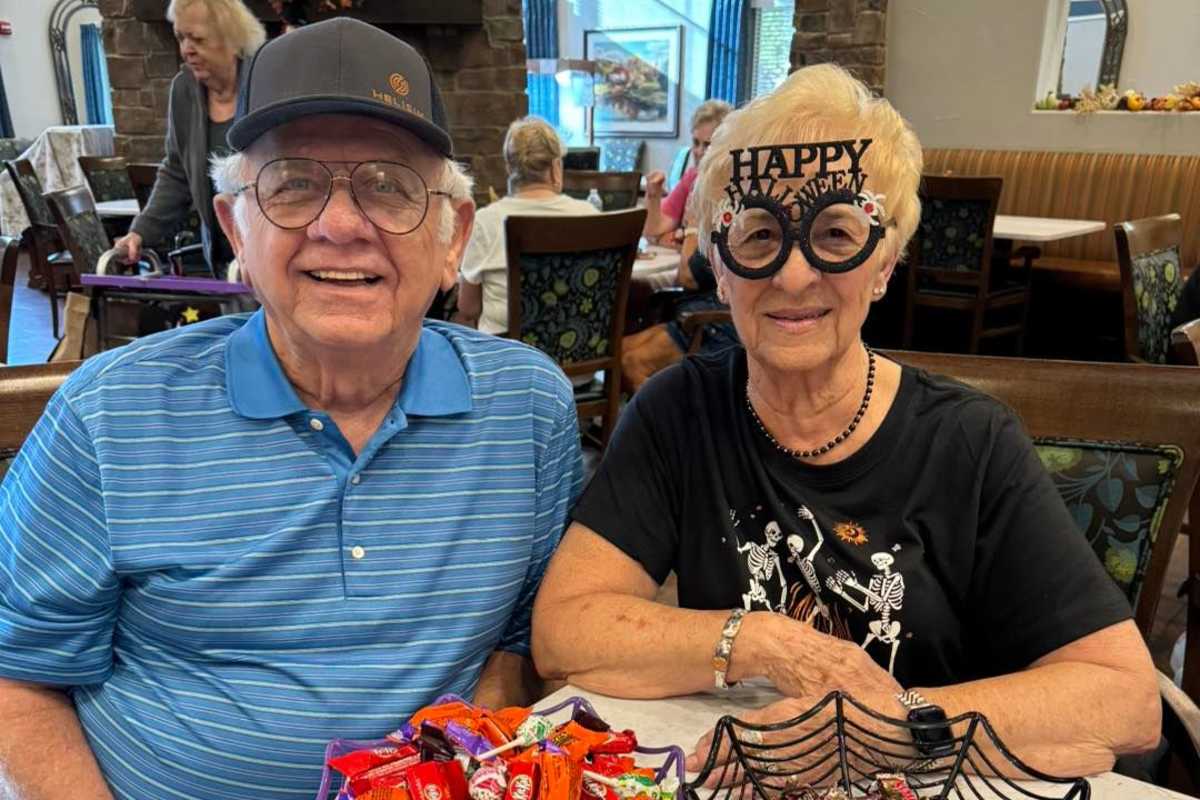 A couple in Halloween theme'd attire at Watercrest at Mansfield in Mansfield, Texas