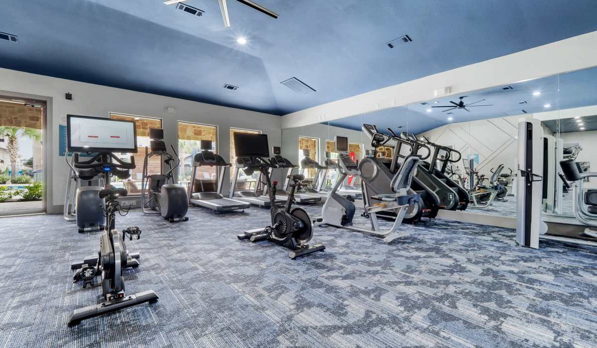 Fitness center with equipment at Seagrove in Conroe, Texas