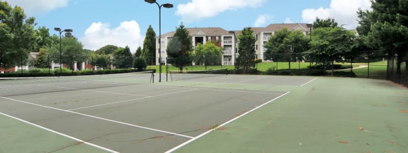 Full tennis court for residents to play on in Acworth, Georgia at Cherokee Summit Apartments