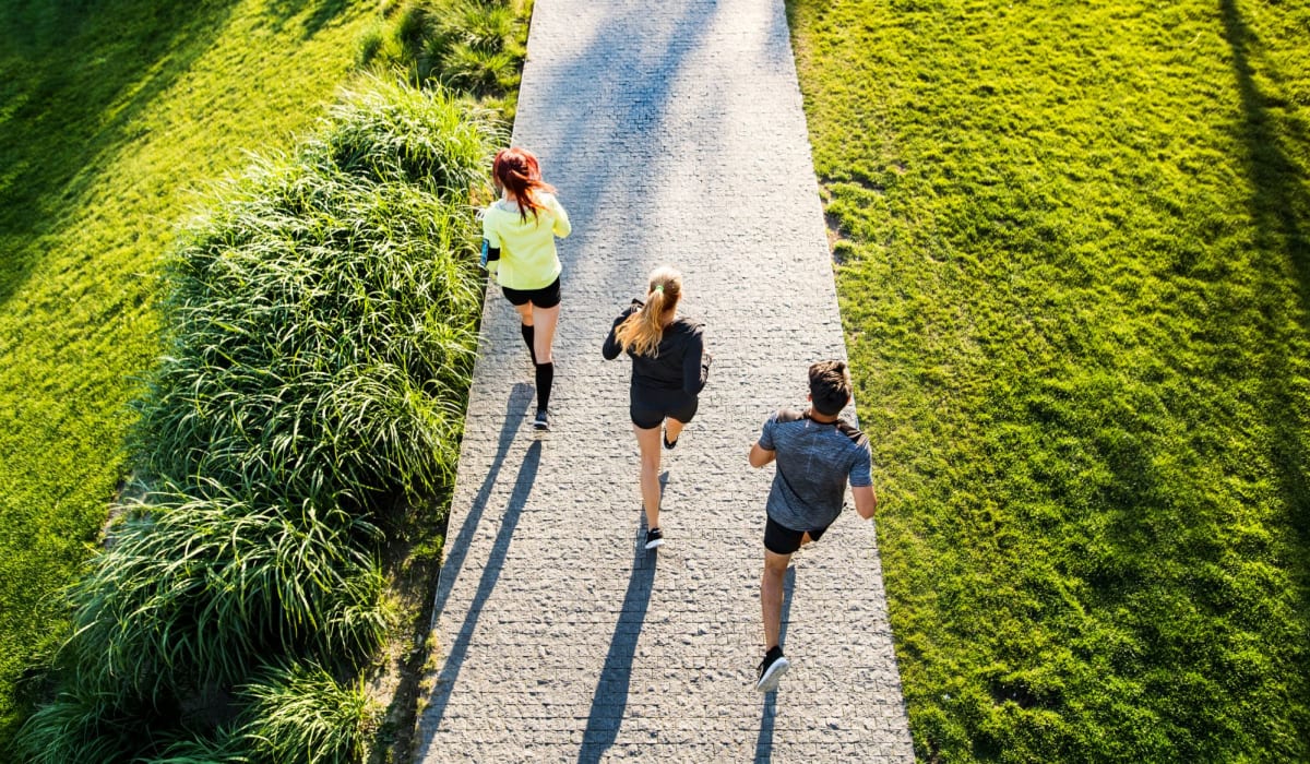 Residents running on a trail near Isles in Roseville, California