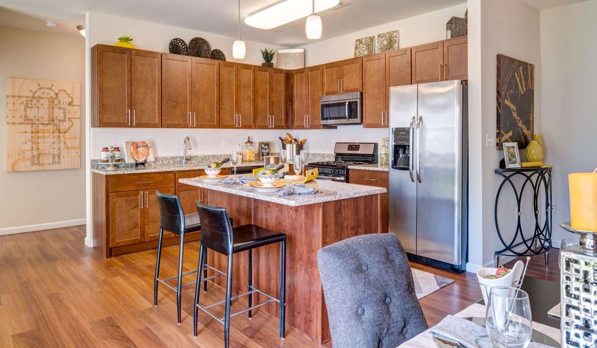 Kitchen with side by side refrigerator at One Glastonbury Place in Glastonbury, Connecticut  