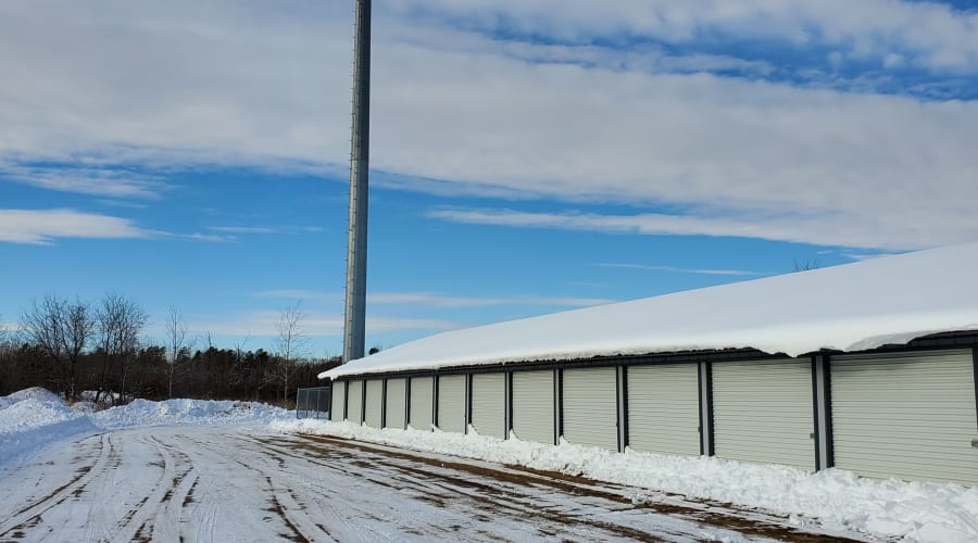 Storage units with white doors and locks at KO Storage of Brainerd in Brainerd, Minnesota