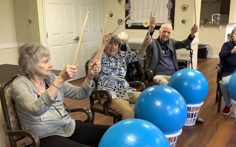 Residents participating in a fun group activity at Grand Villa of Englewood in Englewood, Florida