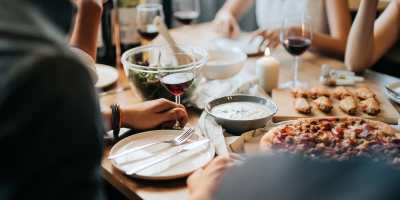 Group of friends enjoying dinner near Vintage Park in Houston, Texas