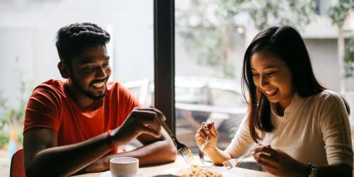 Couple enjoying their meal in a local restaurant near Cypress Trace in Brandon, Florida