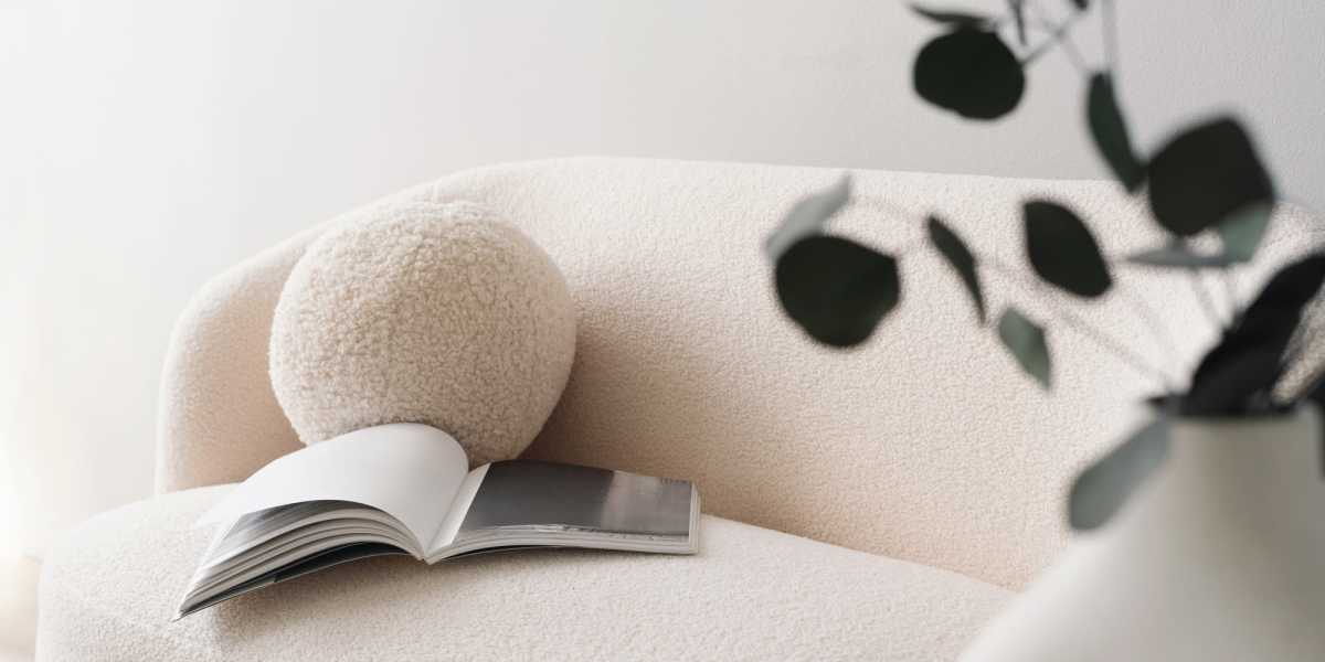 Couch in the living room at Flatiron West Trade in Charlotte, North Carolina