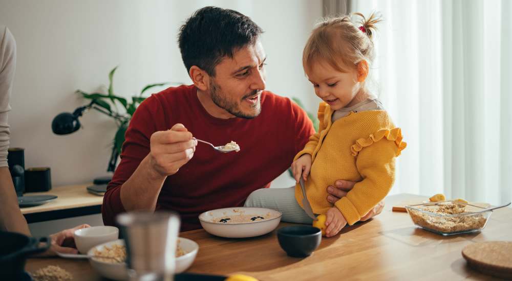 Resident with his kid at Citrine Apartments in Healdsburg, California
