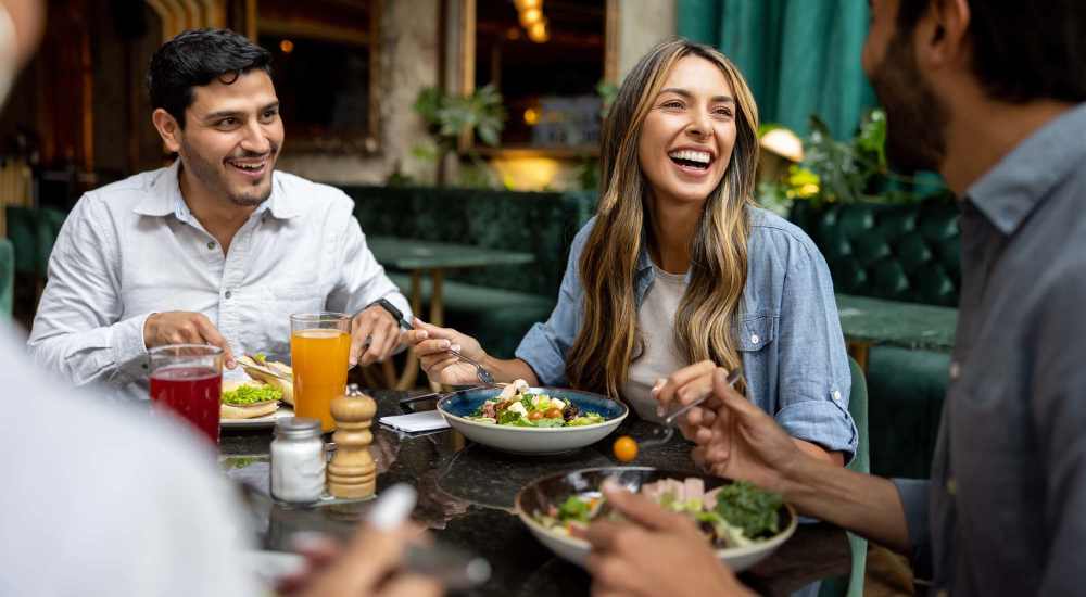 Residents having delicious food at a restaurant near Bass Lake Crossing in New Hope, Minnesota  
