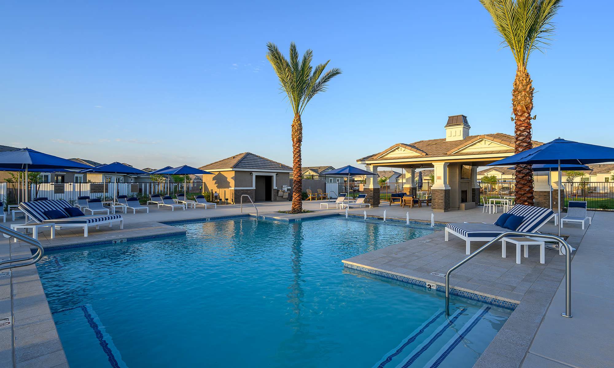 Pool at dusk at The Montgomery at Rancho Mercado in Surprise, Arizona