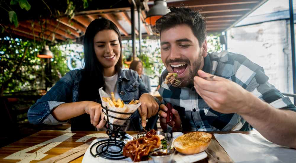 Couple having lunch at a restaurant near The Eva in Sandy Springs, Georgia