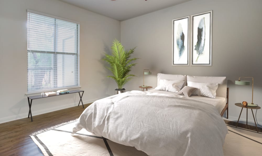 Hardwood floors in the open-concept layout of a model home at Riata Austin in Austin, Texas